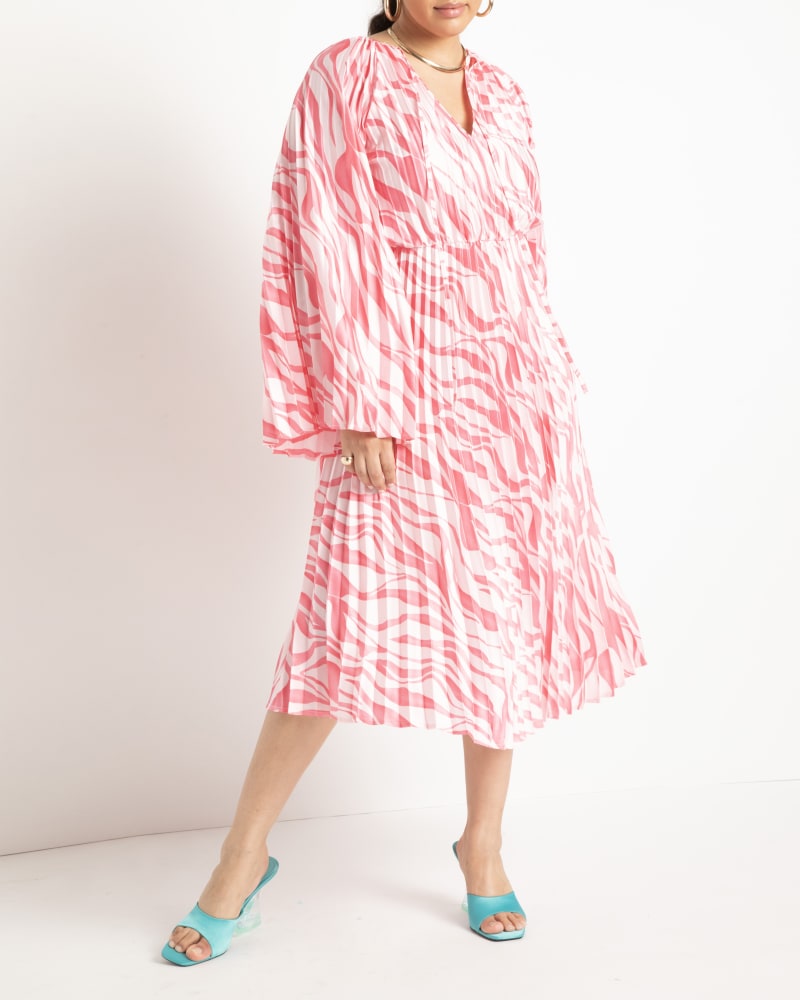 Front of a model wearing a size 22 Pleated Printed Dress in Tiger Crush by ELOQUII. | dia_product_style_image_id:271018